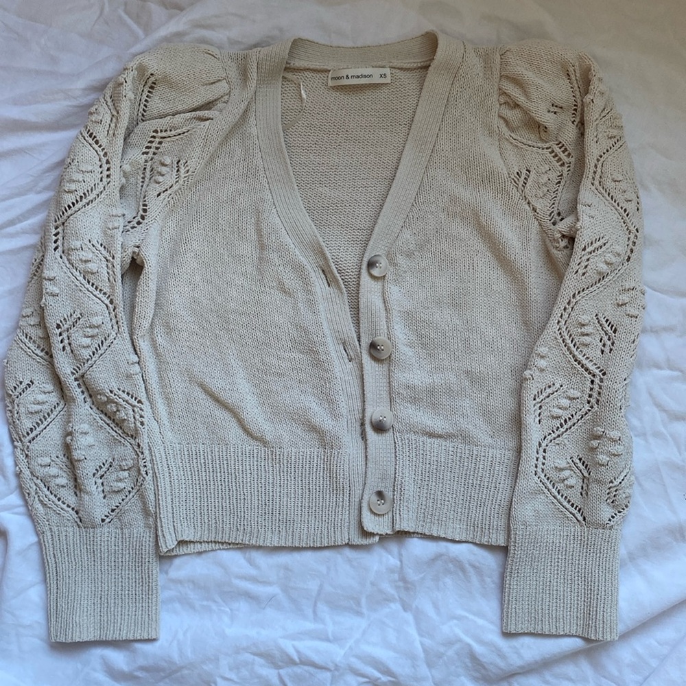 Waist length button sweater